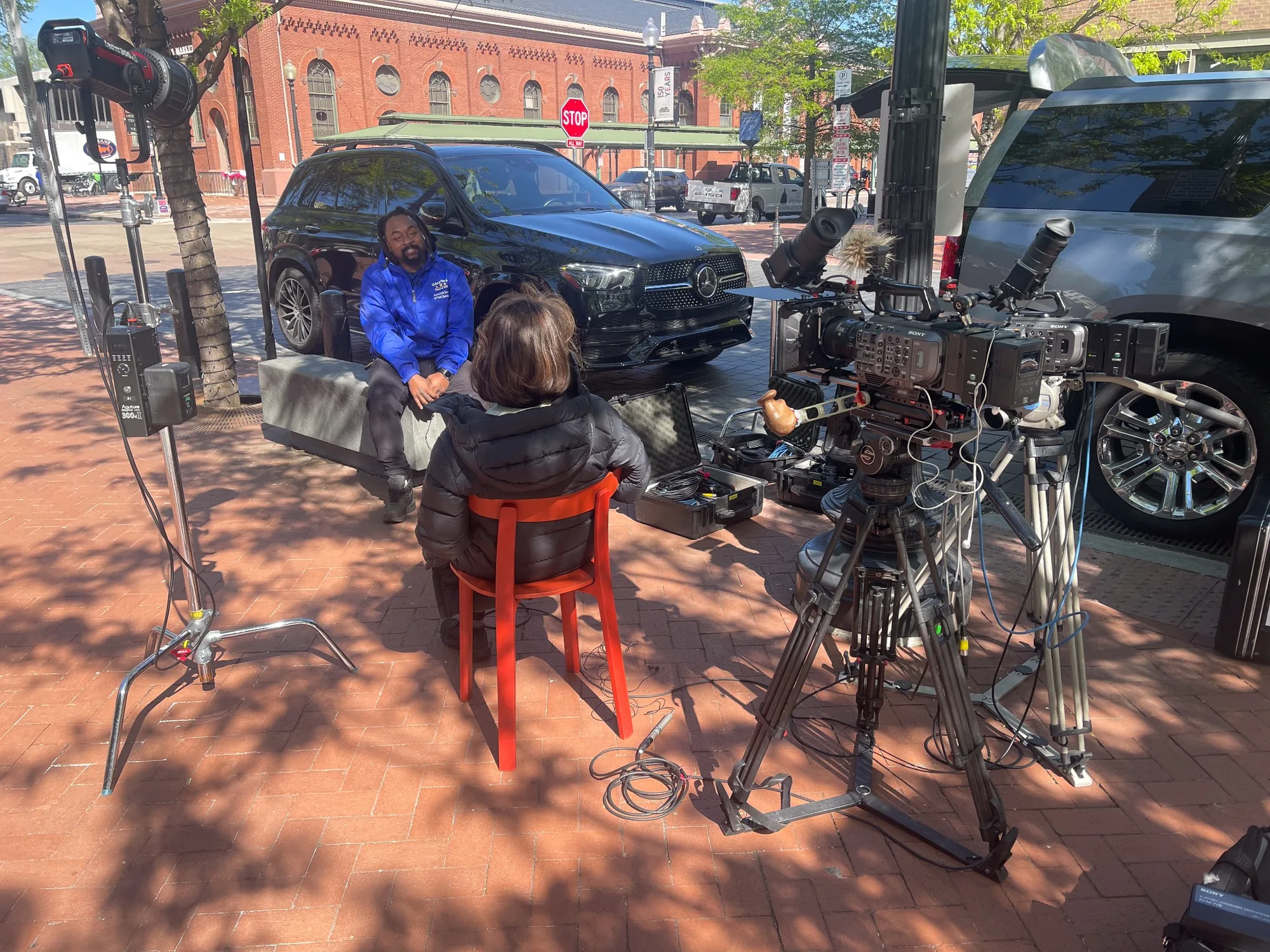 Documentary crew interviewing a community leader on H Street